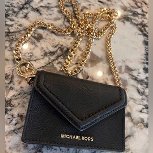 Michael Kors Card Case crossbody gold chain
Color: Black
NWOT